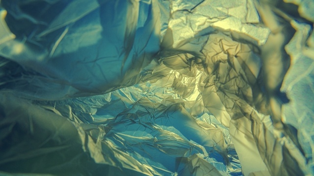 Inside a colored plastic bag