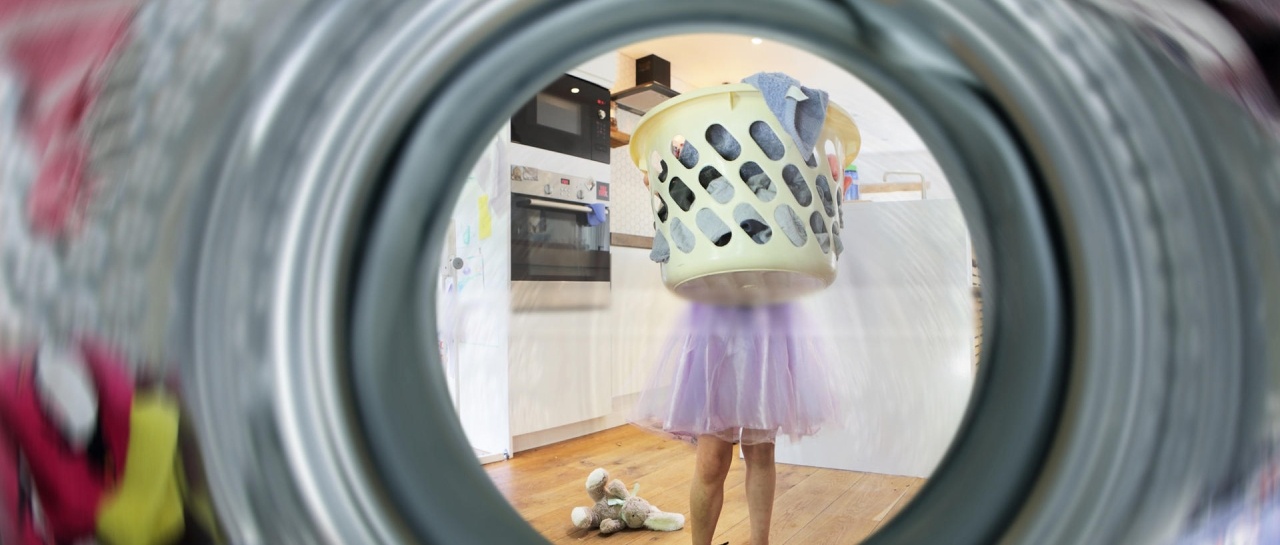 Young girl doing the laundry