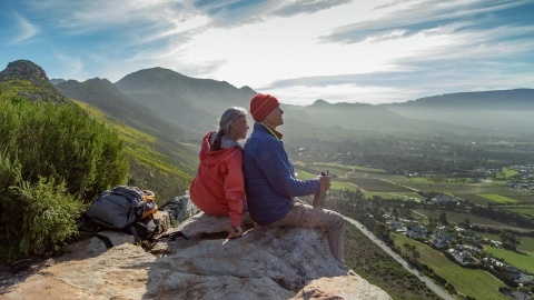 Senior couple enjoying the views on a mountain hike